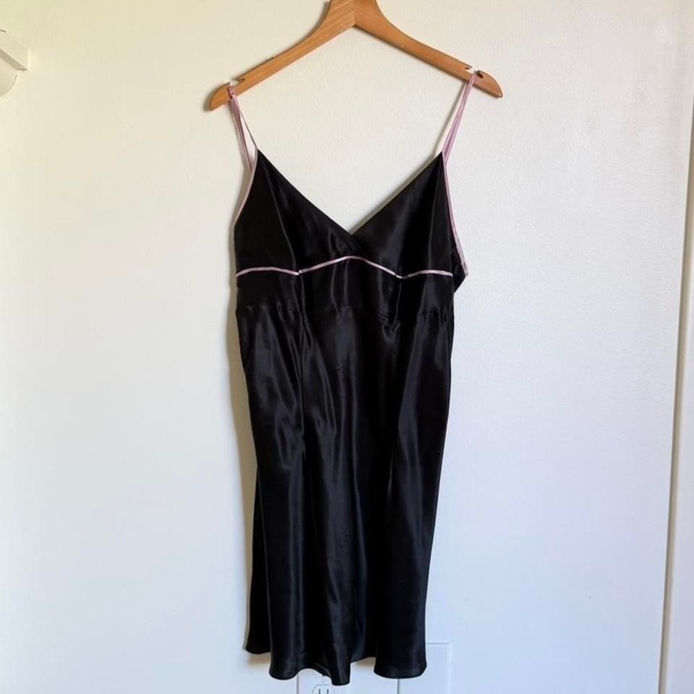Black 100% silk slip dress with pink trim and adjustable straps.m